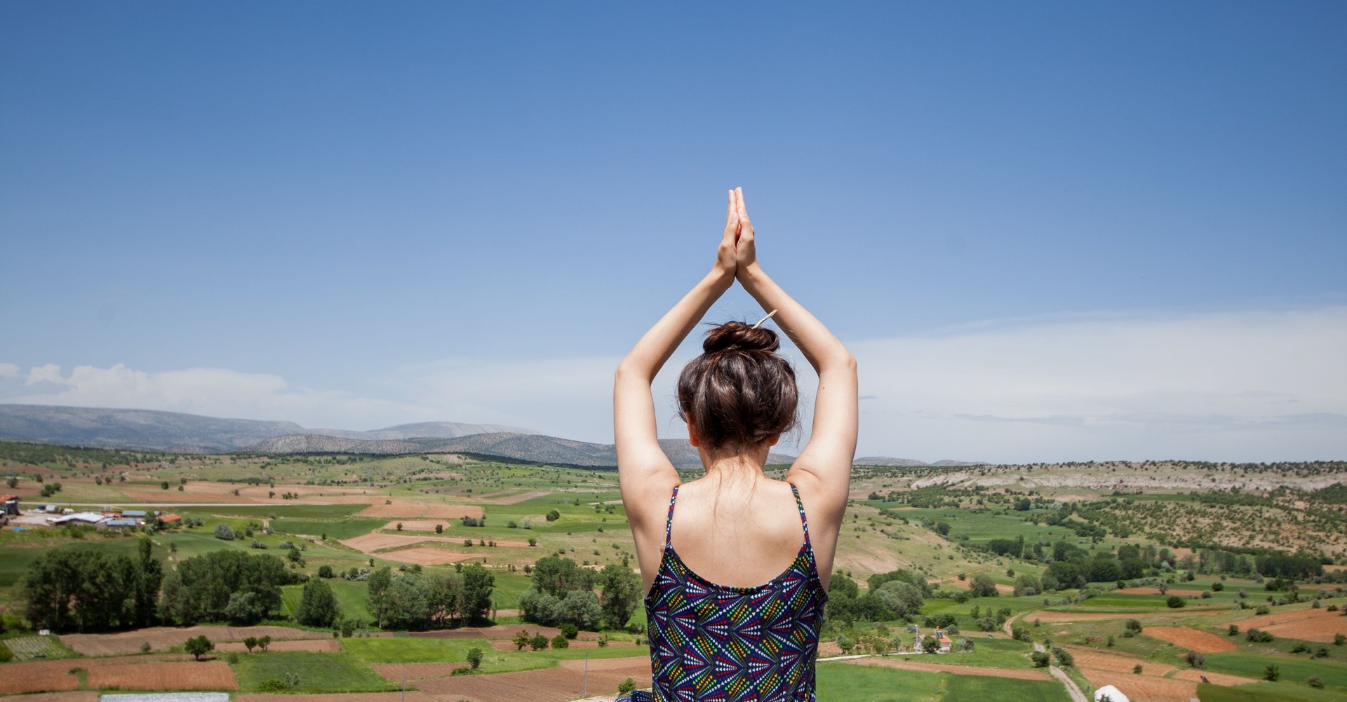 woman meditating in nature